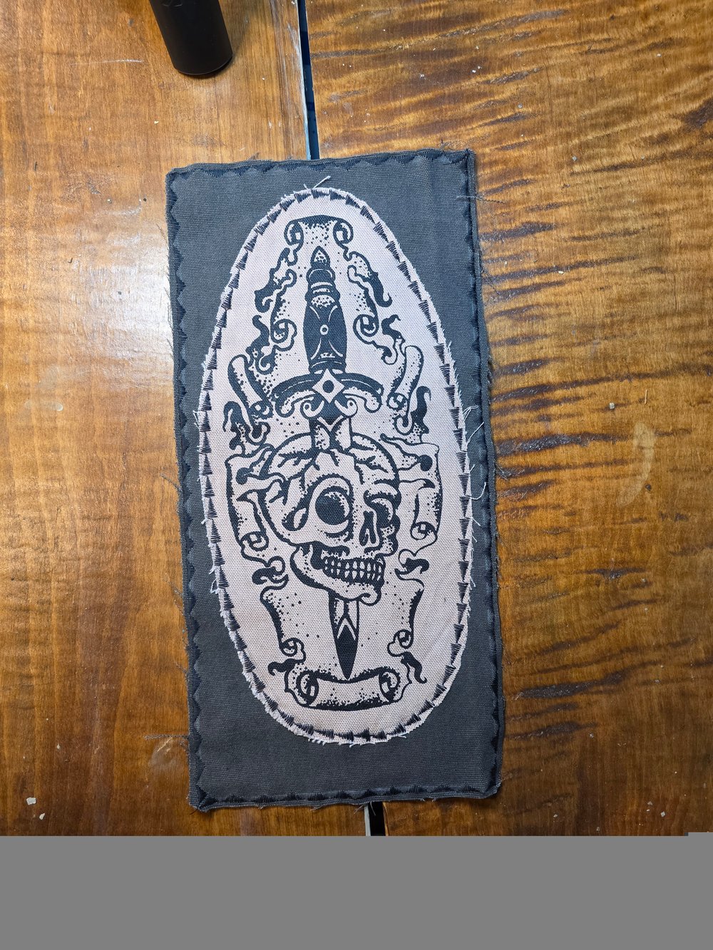 Dagger skull patch.