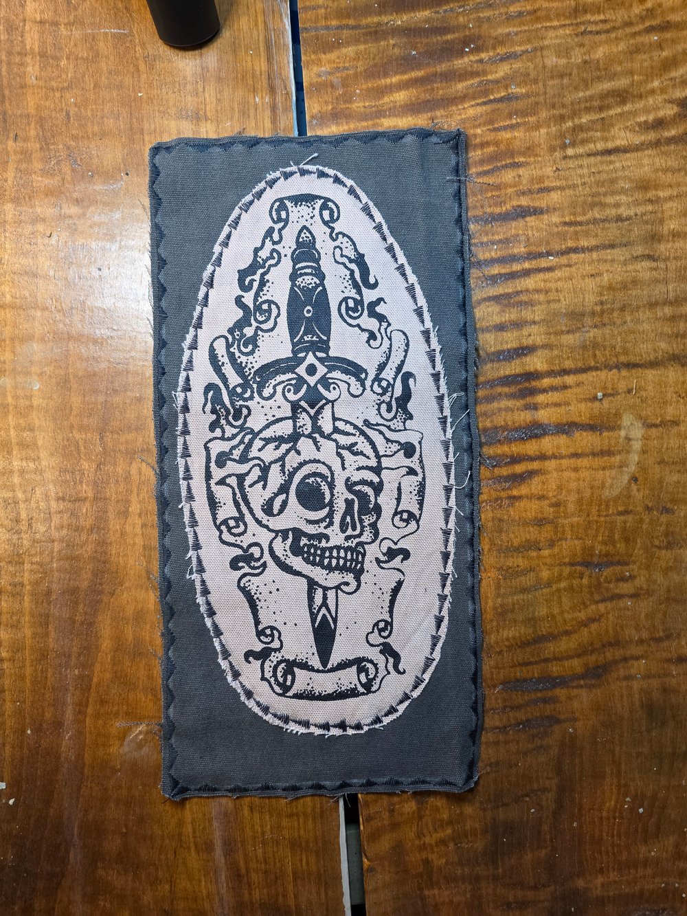 Dagger skull patch.