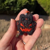 Image 2 of Black Micro Kitty Keychain with Gold Wings