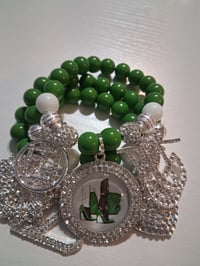 Image 1 of Green purse w heels
