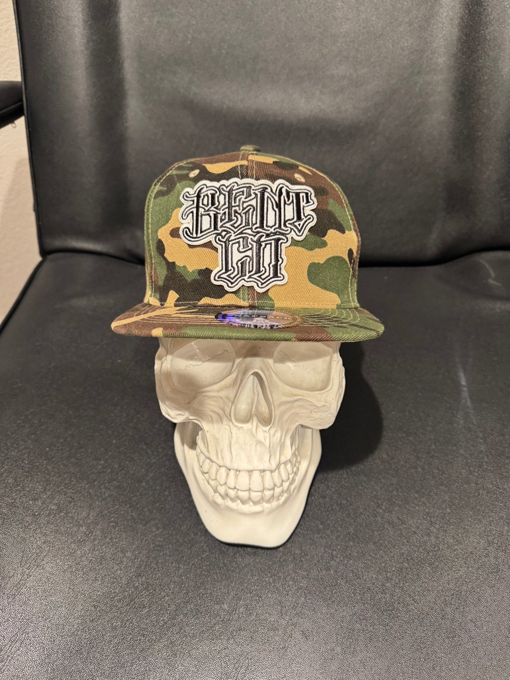 Camo snap back with patch