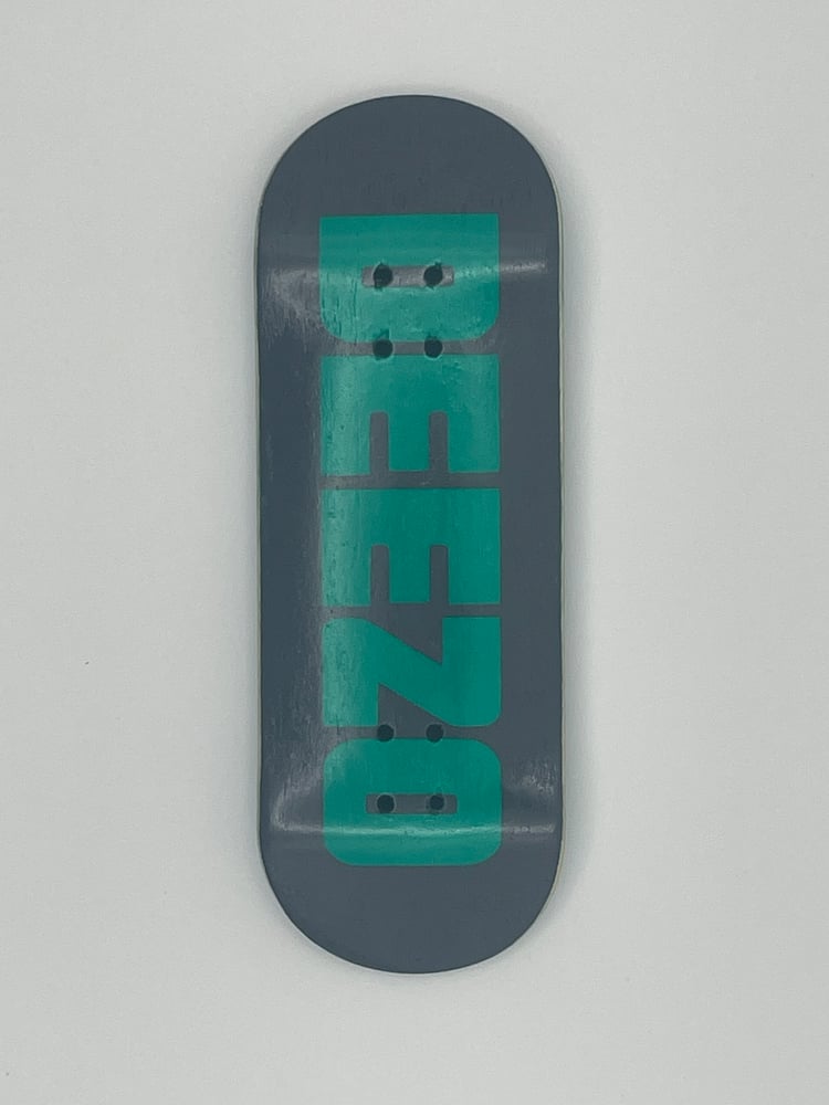 Image of Old Mold Graphic Blem - Painted Deezo Logo Teal / Grey