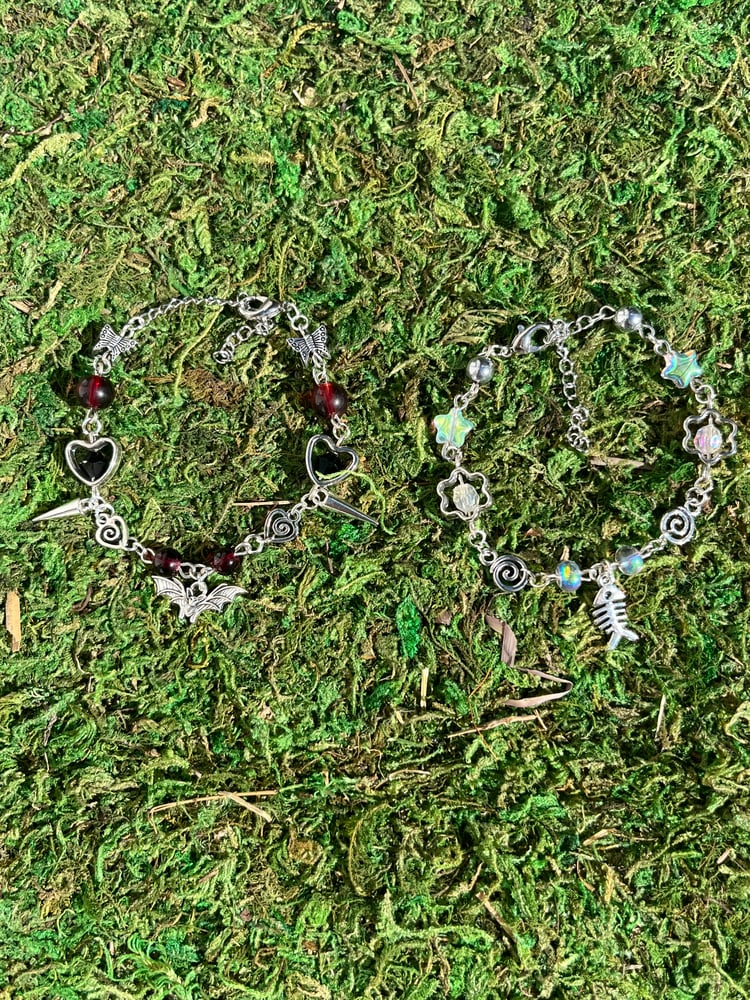 Image of Teeth, Spider, Fish Bone, and Bat Bracelets