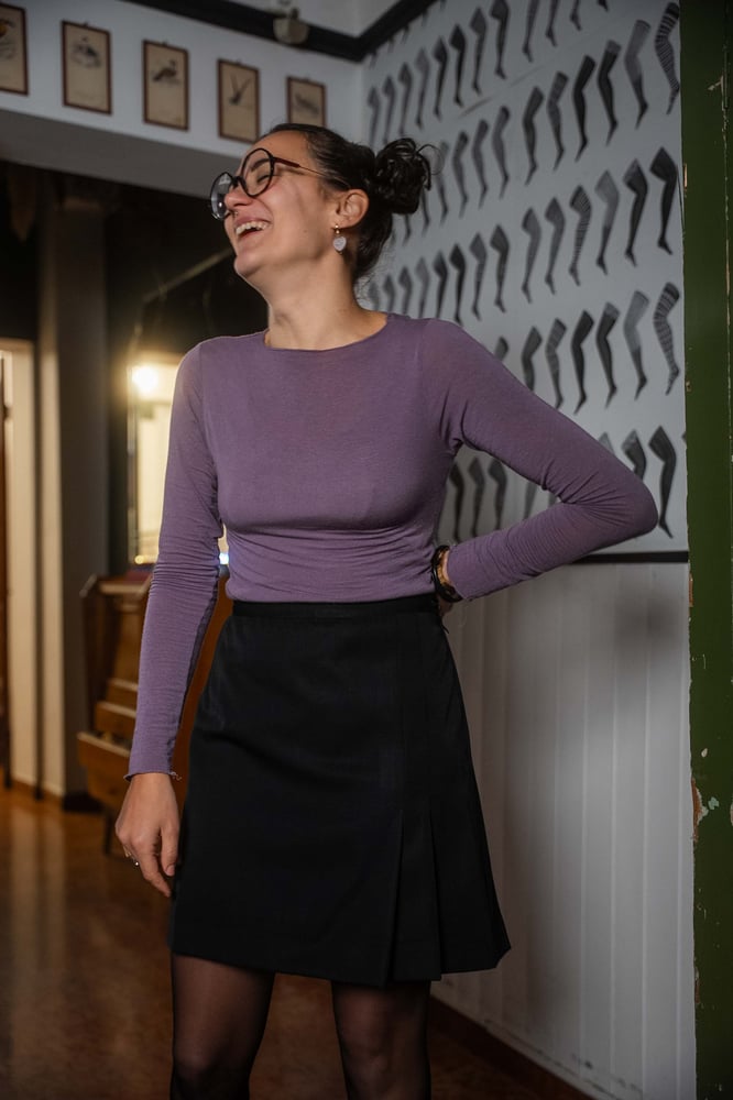 Image of Gonna nera pieghette