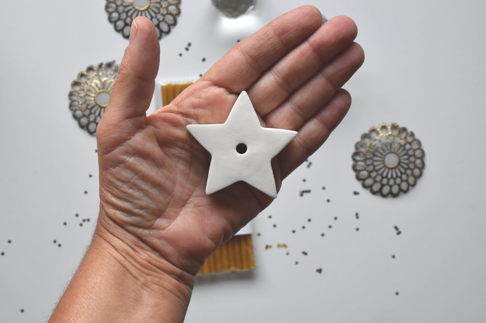 Image of STAR CANDLE HOLDER PACK