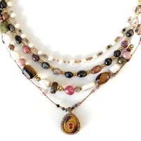 Image 7 of Capsule Ephémère Oeil de tigre Nacrée