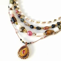 Image 4 of Capsule Ephémère Oeil de tigre Nacrée