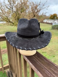 Image 2 of “Black Beauty” is an All Black Heart Shaped Cowboy Hat with Gold Accents