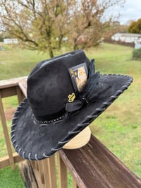 Image 1 of “Black Beauty” is an All Black Heart Shaped Cowboy Hat with Gold Accents