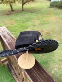 Image 6 of “Black Beauty” is an All Black Heart Shaped Cowboy Hat with Gold Accents