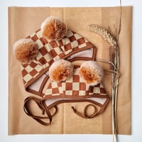 Checkerboard pom pom bonnet 