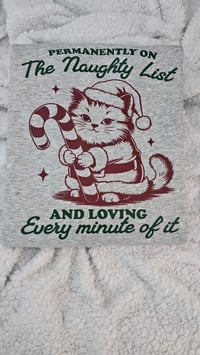 Image 1 of Permanently on the naughty list sweater