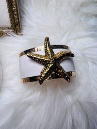 Image 1 of Golden Starfish Ocean Cuff Bracelet – White Leather & Hammered Gold Tone – Coastal Boho Jewelry