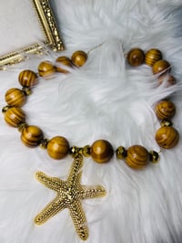 Image 2 of Golden Starfish Wood Bead Necklace – Natural Boho Coastal Chic Jewelry