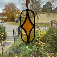 Image 4 of Iridescent orange diamond.