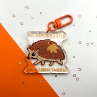 Image 1 of Hedgehog keychain „ nie wkurwiaj jeża gdy po jabłko zmierza” 