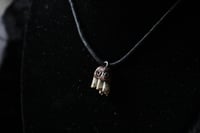 Image 2 of Dead good naturally stained tiny sheep tooth necklace