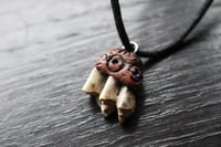 Image 1 of Dead good naturally stained tiny sheep tooth necklace