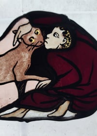 Image 2 of Medieval man kissing his cat