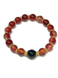 Image 1 of 1PC. POLISHED CRACKLE GLASS BEAD/BLACK FOCAL BEAD BRACELET by LAZY HOUND DESIGNS