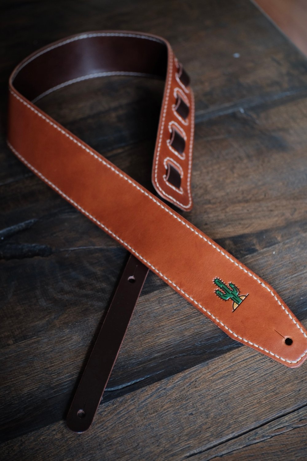 Image of Bläck Tattoo X Old Dutch Leatherworks Guitar/bass strap (cognac/chocolate)
