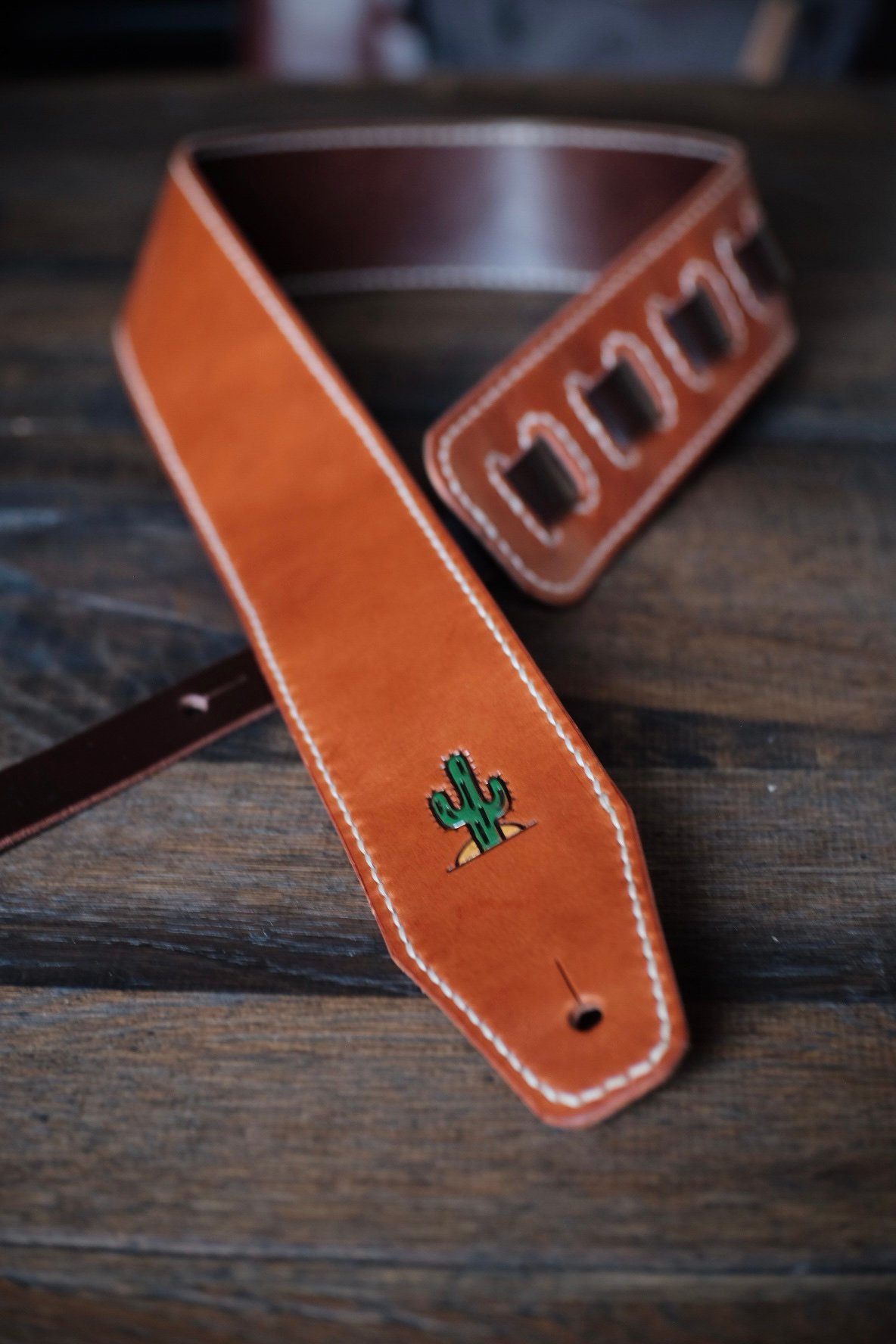 Image of Bläck Tattoo X Old Dutch Leatherworks  Guitar/bass strap (cognac/chocolate)