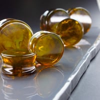 Image 3 of Smoke Plugs - Epoxy Resin - Round - 6mm - 50mm - Amber and Coffee - Custom Plugs for Stretched Ears 