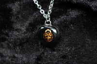Image 1 of dead good tiny ladybird pendant 