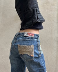 Image 1 of DISTRESSED LOW RISE JEANS