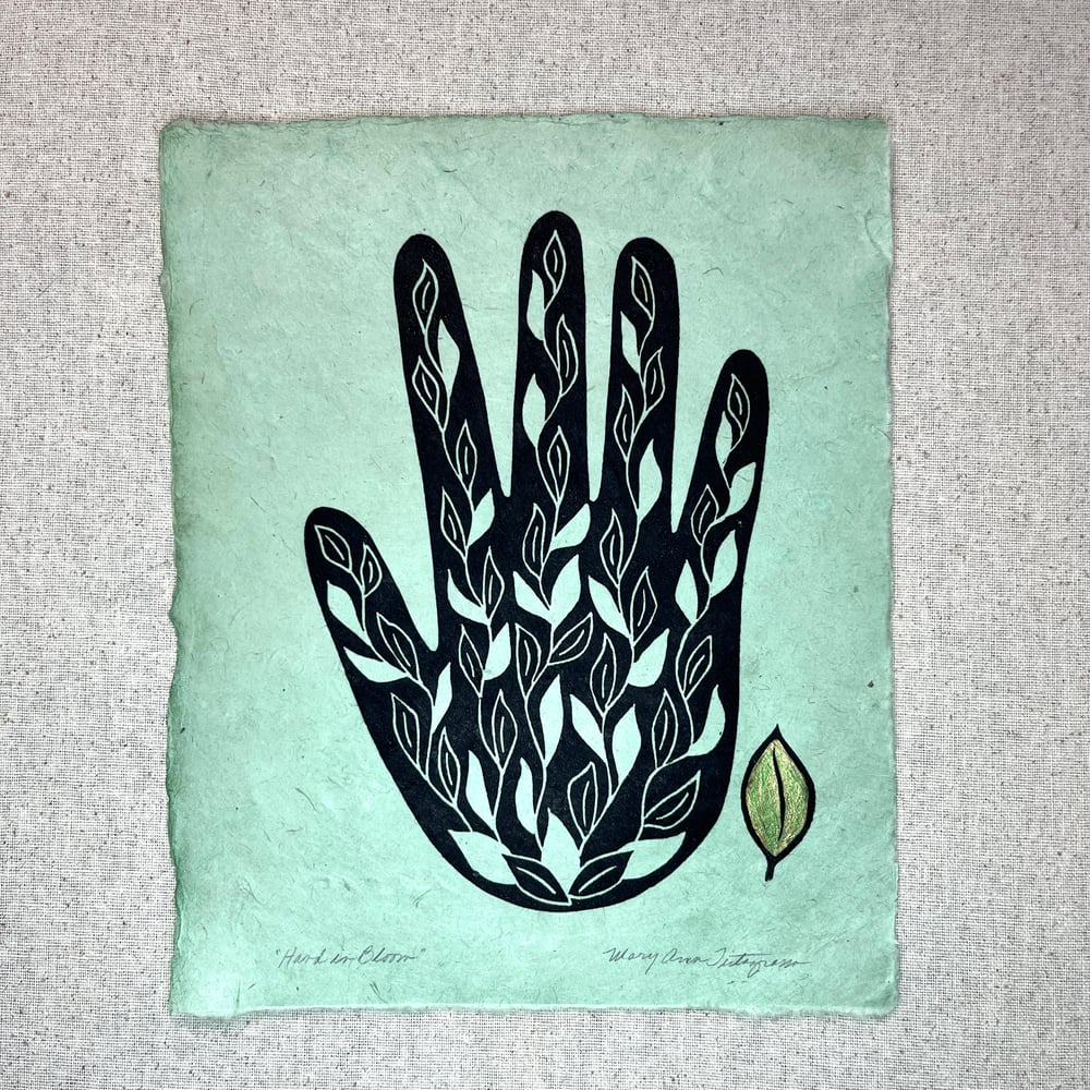 Image of Hand in Bloom (black on green)