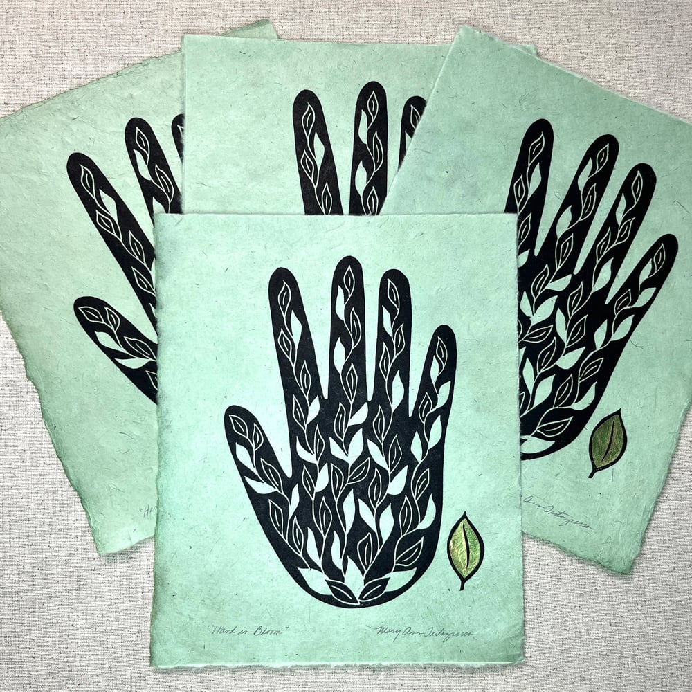 Image of Hand in Bloom (black on green)