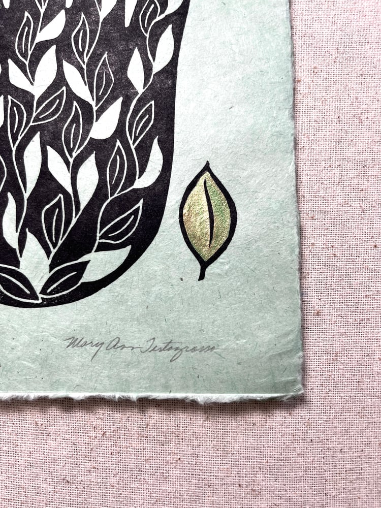 Image of Hand in Bloom (black on green)