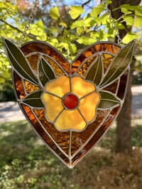 Image 1 of yellow flower heart