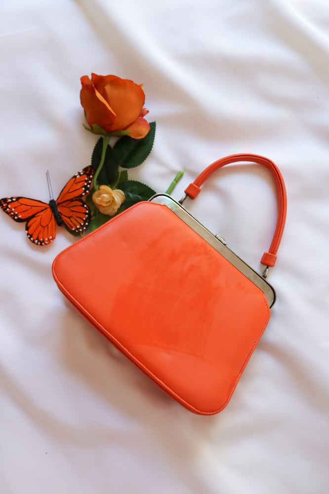 Image of Vintage Monarch Orange Clasp Purse with Floral Silver Details 