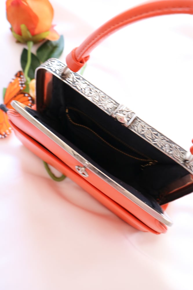 Image of Vintage Monarch Orange Clasp Purse with Floral Silver Details 