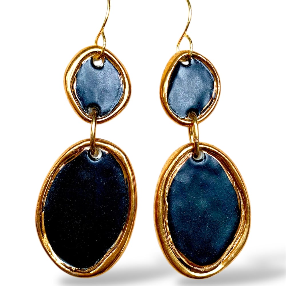 Image of Black with gold raised edges (2.5x6.5cm)