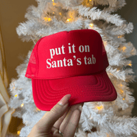 Put it on Santa's Tab Red Trucker Hat