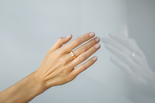Image of gold plated silver hexagon ring with inscription in Latin
