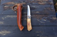 Image 5 of Elegant and timeless — this luxury handmade Puukko 14C28N blade, birch burl handle