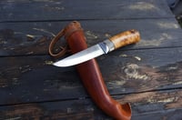 Image 10 of Elegant and timeless — this luxury handmade Puukko 14C28N blade, birch burl handle