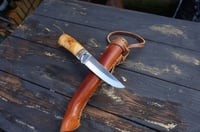 Image 11 of Elegant and timeless — this luxury handmade Puukko 14C28N blade, birch burl handle