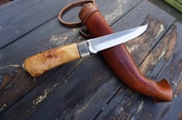 Image 12 of Elegant and timeless — this luxury handmade Puukko 14C28N blade, birch burl handle