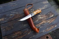 Image 13 of Elegant and timeless — this luxury handmade Puukko 14C28N blade, birch burl handle