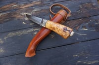 Image 15 of Elegant and timeless — this luxury handmade Puukko 14C28N blade, birch burl handle