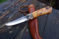 Image 1 of Elegant and timeless — this luxury handmade Puukko 14C28N blade, birch burl handle