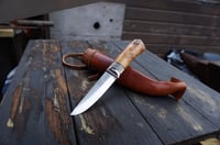 Image 17 of Elegant and timeless — this luxury handmade Puukko 14C28N blade, birch burl handle