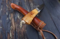Image 21 of Elegant and timeless — this luxury handmade Puukko 14C28N blade, birch burl handle