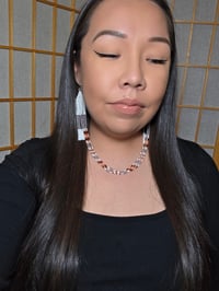 Image 2 of White/brown/orange dentaliums 