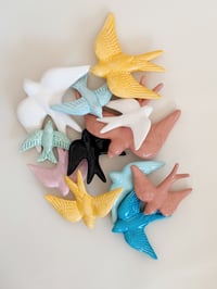 Image 1 of Hirondelles en céramiques