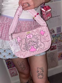 Image 1 of angel nurse bunny heart puffer bag